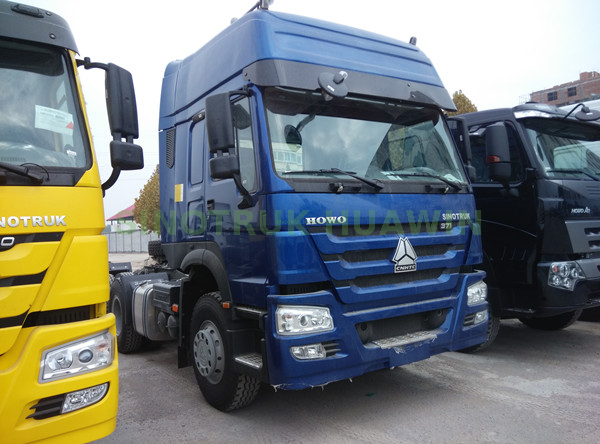 Camión tractor SINOTRUK HOWO 6x4 con dos traviesas