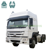 Camión tractor SINOTRUK HOWO 6x4 con dos traviesas